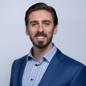 A headshot photo of Sean Coveney.