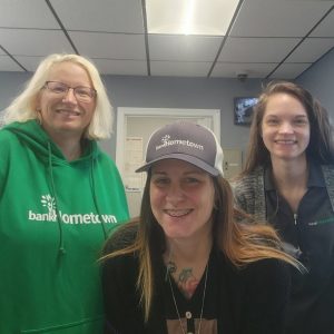 bankHometown employees wearing bank-branded clothing.