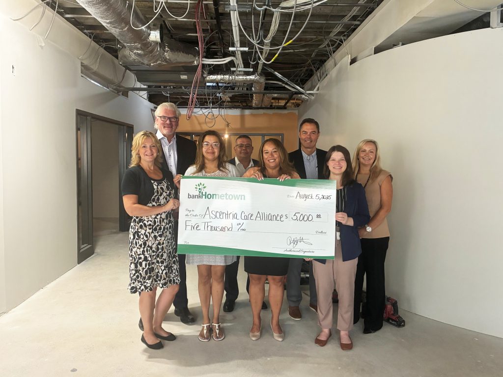 A check presentation for Asentria Care Alliance.