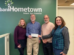 Sarah Wolfburg, coordinator, Northeast Connecticut Education Foundation; Joseph Adiletta, president, Northeast Connecticut Education Foundation; Peter Deary, vice president, Northeast Connecticut Education Foundation; Kim Sweet, branch manager, bankHometown