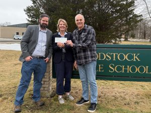Greg Hesler, treasurer, Woodstock Education Foundation ; Karen Donovan, president, Woodstock Education Foundation ; George Dimopoulos, vice president, branch officer, bankHometown 