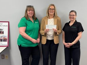 Jen McKenna, assistant vice president, branch officer, bankHometown; Michelle Raynor, superintendent, Brooklyn Public Schools; Lisa Sorel, assistant manager, bankHometown