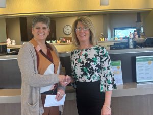 Monique Pierangeli, superintendent, Webster Public Schools; Tarese Lopriore, branch officer, bankHometown