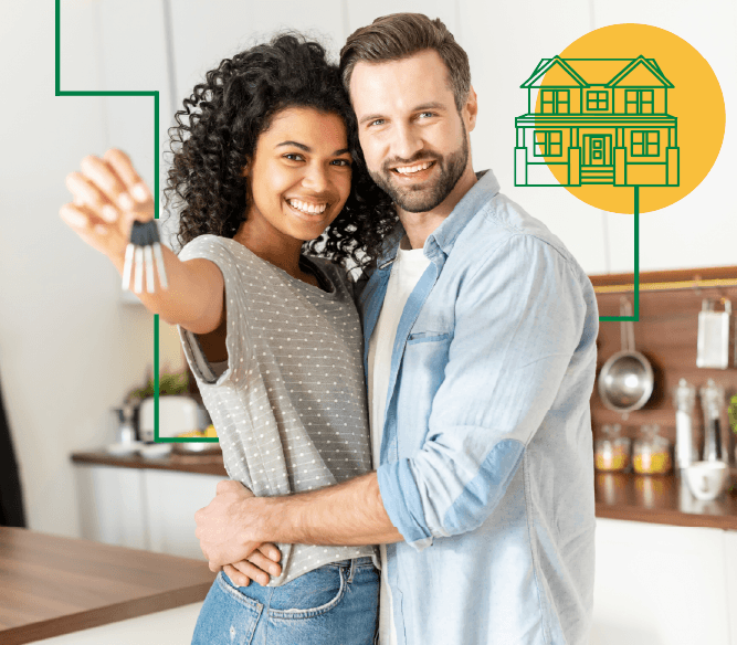 A woman and man holding up a house key in their new home.